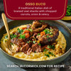 McCormick's Osso Buco, a traditional Italian dish of braised veal shanks with chopped carrots, onions, and celery, served over polenta.