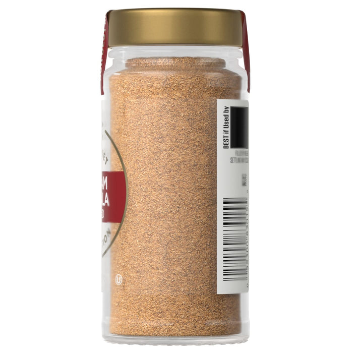 A jar of McCormick Paprika spice is shown.