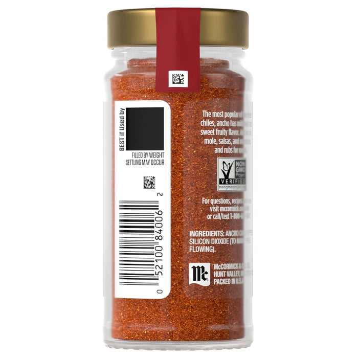 A jar of McCormick chili powder is displayed, showcasing its label and barcode.
