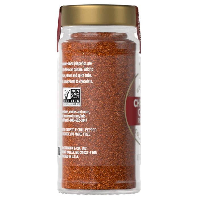 A jar of McCormick Chili Seasoning is displayed, showcasing its vibrant color and texture.