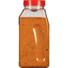 A clear plastic jar with a red lid filled with McCormick Grill Mates Montreal Steak Seasoning.
