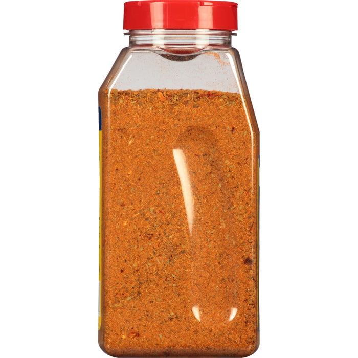 A clear plastic jar with a red lid filled with McCormick Grill Mates Montreal Steak Seasoning.