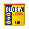 A container of Old Bay Seasoning with a red lid and a yellow and blue label.