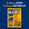 A yellow and blue packet of Old Bay Regular Crab Cake Seasoning Mix 1.24 Oz is displayed against a dark blue background with text stating it is great on seafood and everything else.
