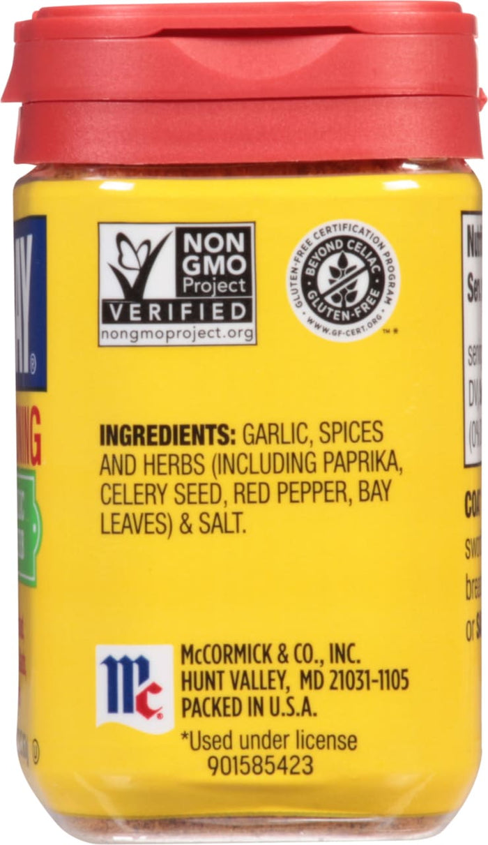 A yellow jar of McCormick Garlic &amp; Herb Seasoning with a red lid.