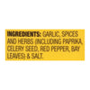 A yellow label with the ingredients for a seasoning blend including garlic spices and herbs.