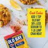 A container of Old Bay Seasoning with a recipe for crab cakes.