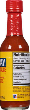 A bottle of McCormick Bay Sauce with nutritional information and ingredients listed on the label.