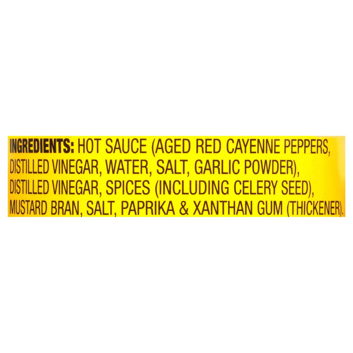 The ingredients for the hot sauce are listed on a yellow label.