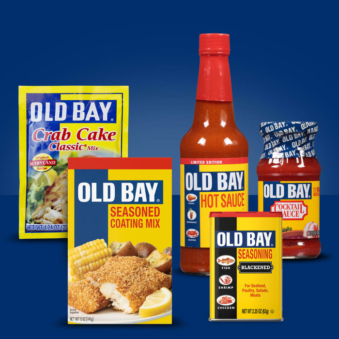 A collection of Old Bay products including crab cake mix, seasoned coating mix, hot sauce, cocktail sauce, and seasoning.
