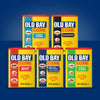 A variety of Old Bay Seasoning flavors are displayed in their iconic yellow cans.