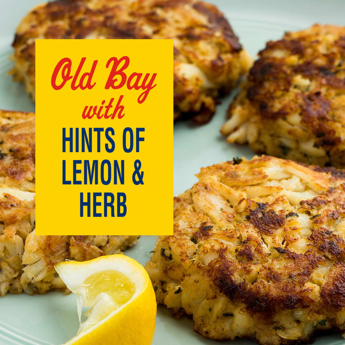 A plate of crab cakes seasoned with Old Bay, lemon, and herbs.