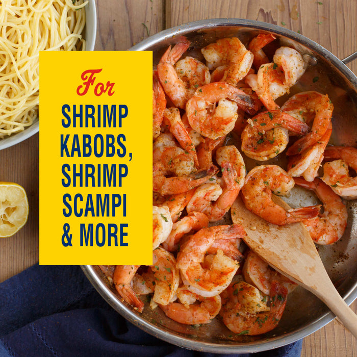 This image promotes a product for shrimp kabobs, shrimp scampi, and more, featuring a pan of cooked shrimp and a side of pasta.