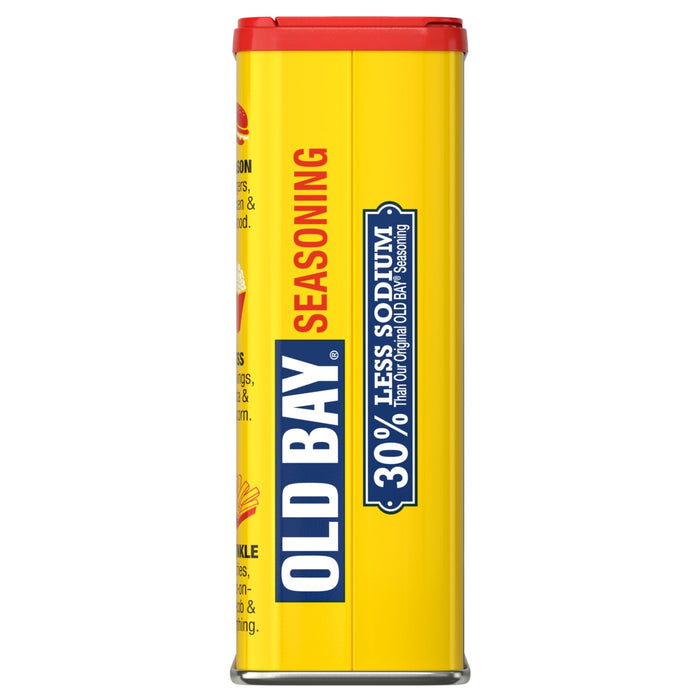 A container of Old Bay Seasoning with a yellow background and red lid.