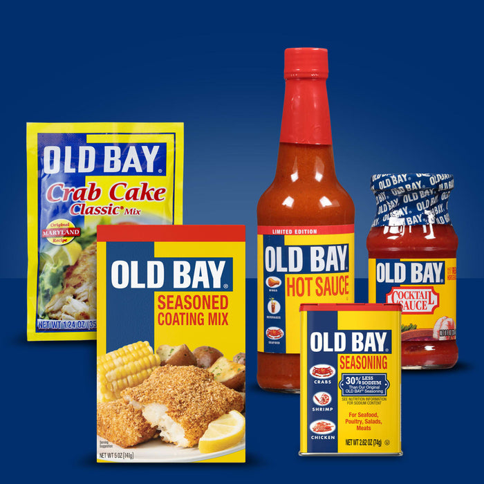A collection of Old Bay products including crab cake mix, seasoned coating mix, hot sauce, cocktail sauce, and seasoning.