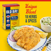 A plate of fried fish seasoned with Old Bay Seasoning, highlighting its unique blend of 18 herbs and spices.