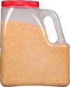 A plastic container filled with a yellow and green seasoning mix.