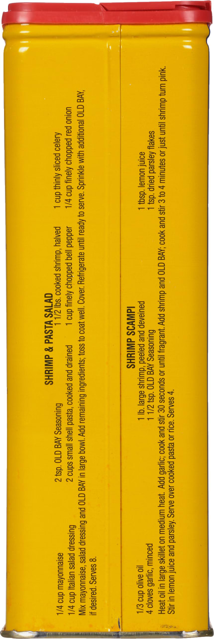 A yellow can of Old Bay Seasoning with instructions for making shrimp and pasta salad and shrimp scampi.