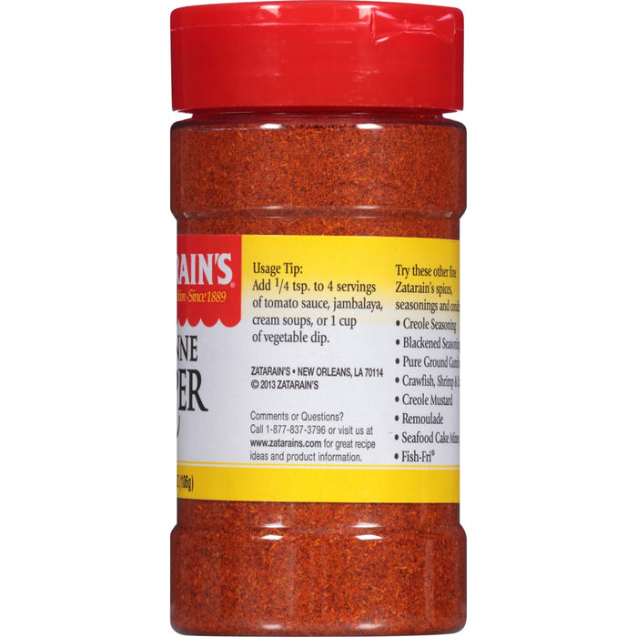 A red plastic container of Zatarain's Cayenne Pepper.