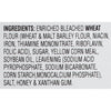 A list of ingredients for a product, including enriched bleached wheat flour, sugar, yellow corn meal, soybean oil, and honey.