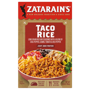 A box of Zatarain's Taco Rice mix with a serving suggestion of the rice with chicken, avocado, cheese, tomatoes, onions, and black beans.