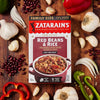 A box of Zatarain's Red Beans &amp; Rice with ingredients around it.