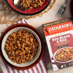 A box of Zatarain's Red Beans &amp; Rice with a bowl of the prepared dish.