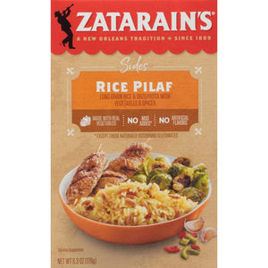 A box of Zatarain's Rice Pilaf with a serving suggestion of rice, grilled chicken skewers, and Brussels sprouts.