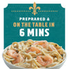 A bowl of shrimp Alfredo pasta with the text 'Prepared &amp; On The Table In 6 Mins' on a teal background.