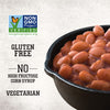 A close-up of Stubb'S Sticky Sweet Baked Beans, Canned Beans, 15.5 Oz. in a black skillet highlights its Non-GMO, gluten-free, and vegetarian qualities.