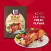 An advertisement shows a package of Mccormick Sesame Ginger All Purpose Sauce Mix Envelope 1 Oz next to a finished dish of salmon and vegetables over rice, all topped with the prepared sauce.