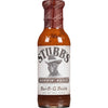 A bottle of Stubbs Moppin Sauce a vinegar and spices Bar-B-Q Baste.