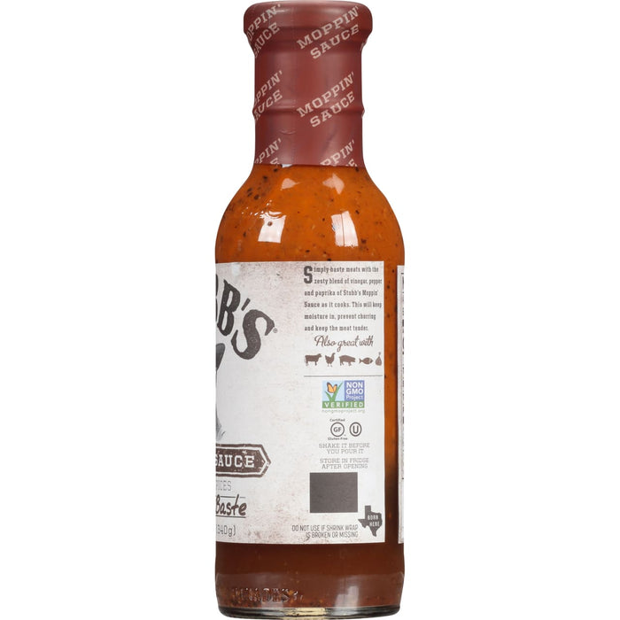A bottle of Stubbs Moppin Sauce with a label that says Also great with and shows a chicken pig fish and onion.