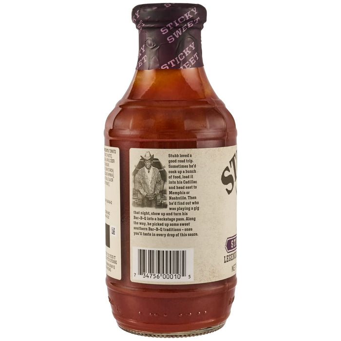 A back view of a Stubbs Sweet Barbeque Sauce Glass Bottle 18 Oz featuring a story about Stubb and his road trips on the label.
