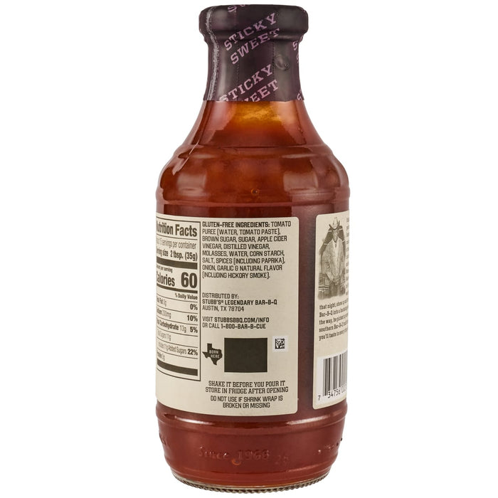 A back view of a Stubbs Sweet Barbeque Sauce Glass Bottle 18 Oz showing the nutrition facts and gluten free ingredients list including tomato puree and apple cider vinegar.