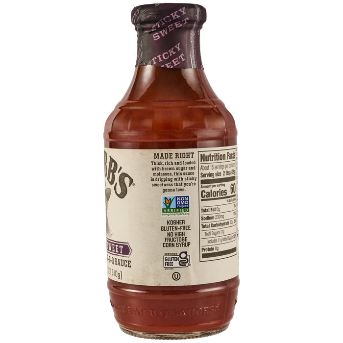 A side view of a Stubbs Sweet Barbeque Sauce Glass Bottle 18 Oz showing the nutrition facts and non-GMO certification on the label.