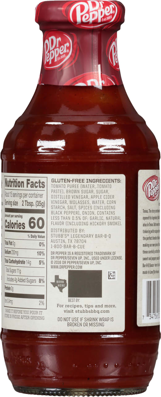 A bottle of Dr Pepper Bar-B-Q Sauce with nutrition facts and ingredients listed on the label.