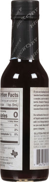 A bottle of Stubb's Hickory Liquid Smoke with nutrition facts and ingredients listed on the label.