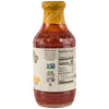 A back view of a Stubbs Sweet Honey &amp; Spice Barbeque Sauce Glass Bottle 18 Oz showing the nutrition facts and a Non-GMO Project Verified seal on the label.