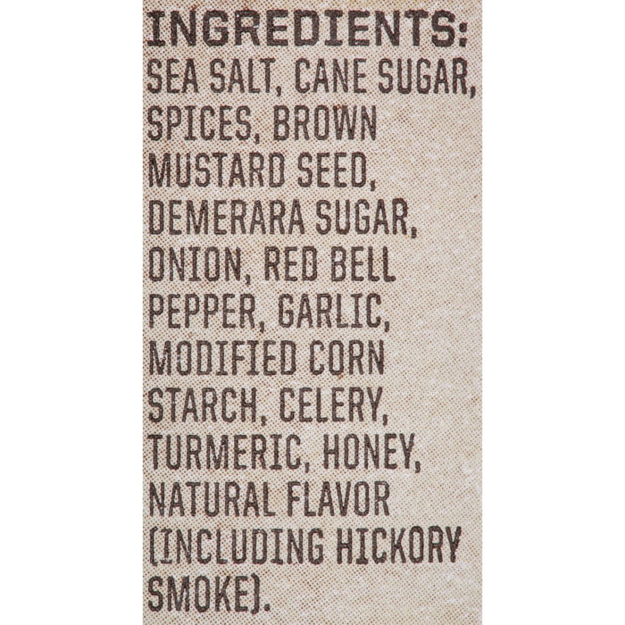 A list of ingredients for a product, including sea salt, cane sugar, spices, brown mustard seed, demerara sugar, onion, red bell pepper, garlic, modified corn starch, celery, turmeric, honey, natural flavor (including hickory smoke).