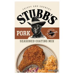 A package of Stubbs Pork Seasoned Coating Mix with a serving suggestion of a breaded pork chop, mac and cheese, and coleslaw.