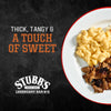 Stubb's Legendary Bar-B-Q advertisement featuring a plate of barbecue with mac and cheese, highlighting the sauce's thick, tangy, and sweet flavor.