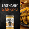 A bottle of Stubb's Bar-B-Q spice rub is featured next to a plate of seasoned chicken wings, promoting the brand's legendary barbecue flavor.