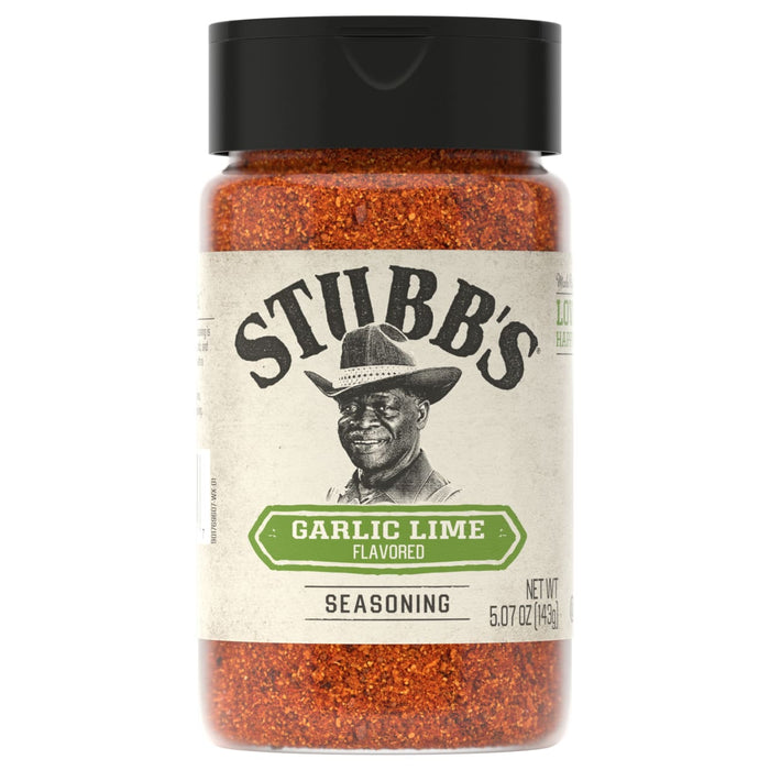 A clear shaker bottle of Stubb's Garlic Lime Flavored Seasoning, part of the Stubb'S, 5.07 Oz product line, is displayed against a white background.