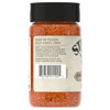The back of a bottle of Stubb'S, 4.62 Oz Texas Smokehouse Style Seasoning shows the label, which describes the blend of paprika, sea salt, and garlic.