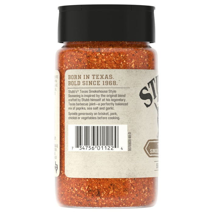 The back of a bottle of Stubb'S, 4.62 Oz Texas Smokehouse Style Seasoning shows the label, which describes the blend of paprika, sea salt, and garlic.