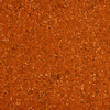 A close up overhead view shows the granular texture and rich reddish brown color of Stubbs Smkhouse E seasoning blend.