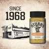 A bottle of Stubbs Hkry Must E seasoning is displayed next to a vintage illustration of the original Stubb's Bar-B-Q restaurant and the text Since 1968.
