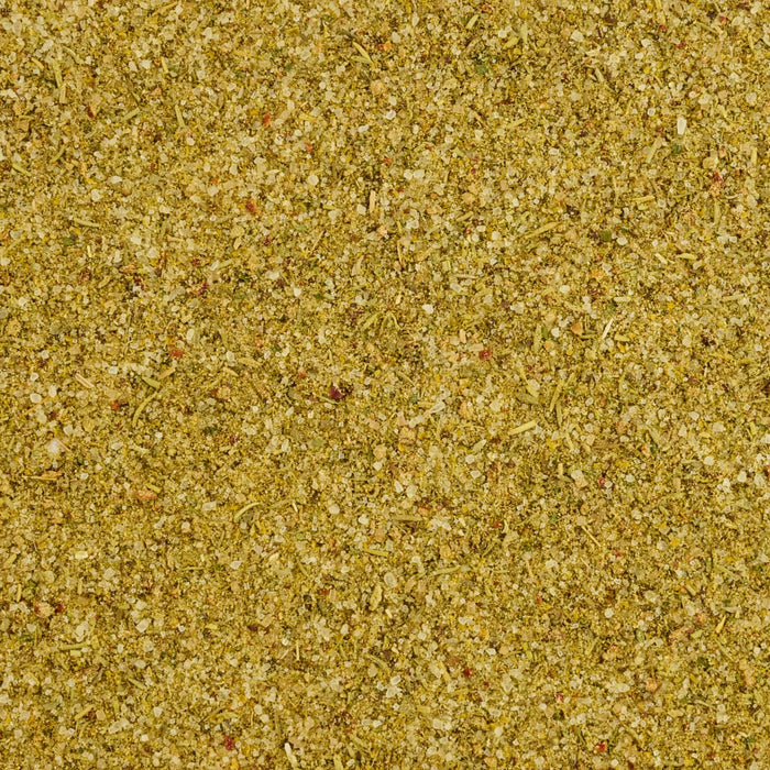 A detailed close up view shows the coarse texture and varied colors of Stubbs Hkry Must E seasoning blend.
