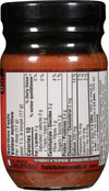 A jar of Thai Kitchen Red Curry Paste Curry 4 Oz, featuring a label that highlights its hot and vegan attributes, with visible nutrition facts and ingredients.